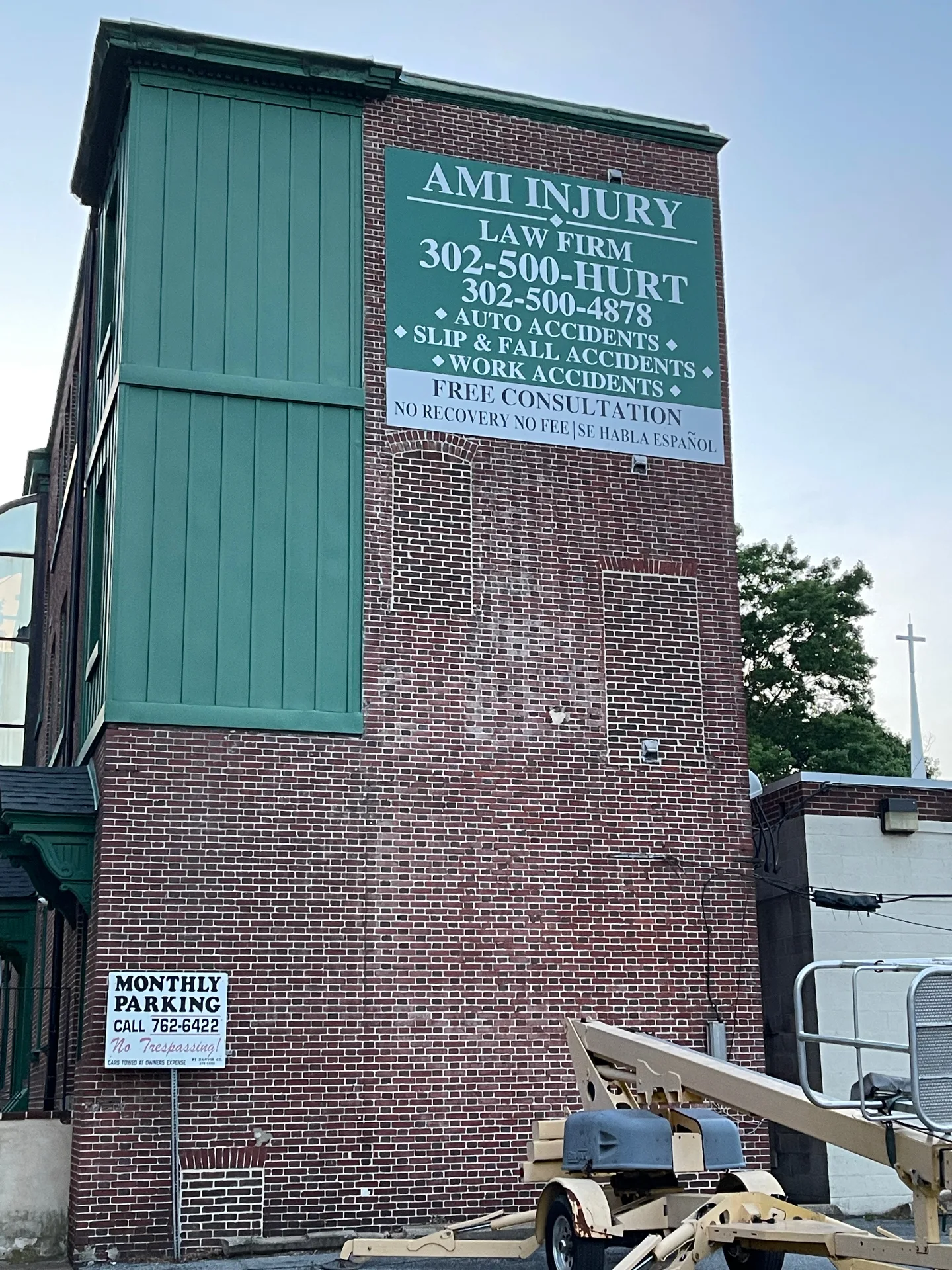 Interior wall sign and office branding for AMI Injury in Delaware