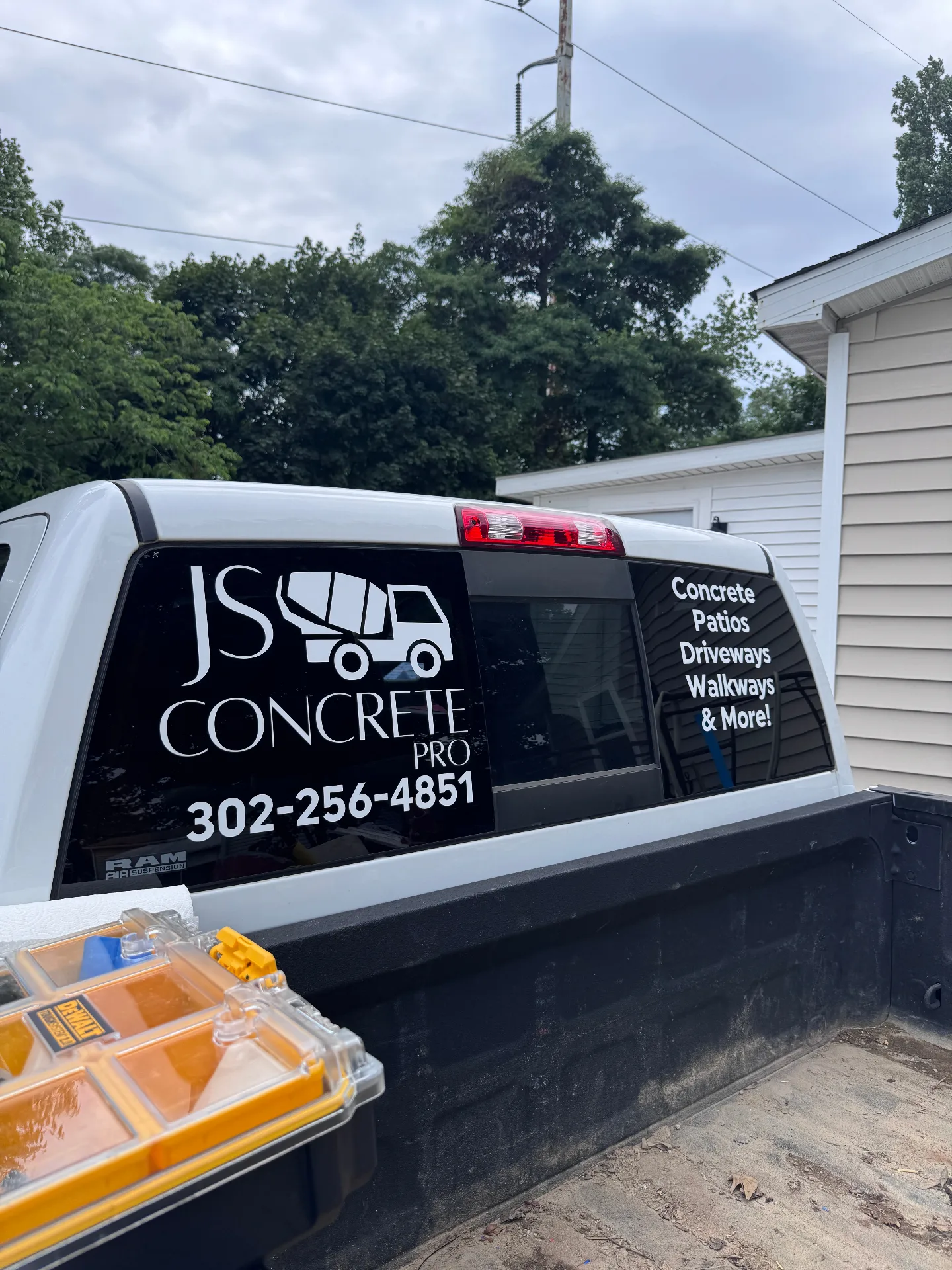 Rear window vinyl graphics for JS Concrete in northern Delaware