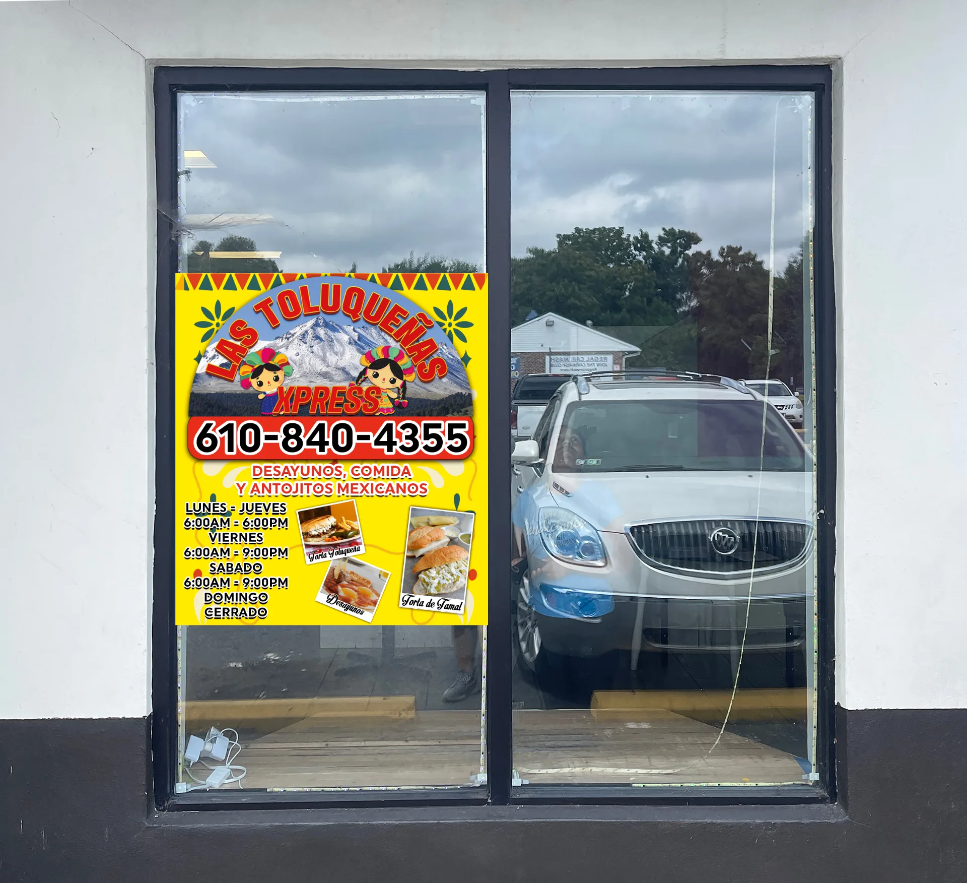 Storefront window graphic for Las Toluqueñas restaurant in Delaware