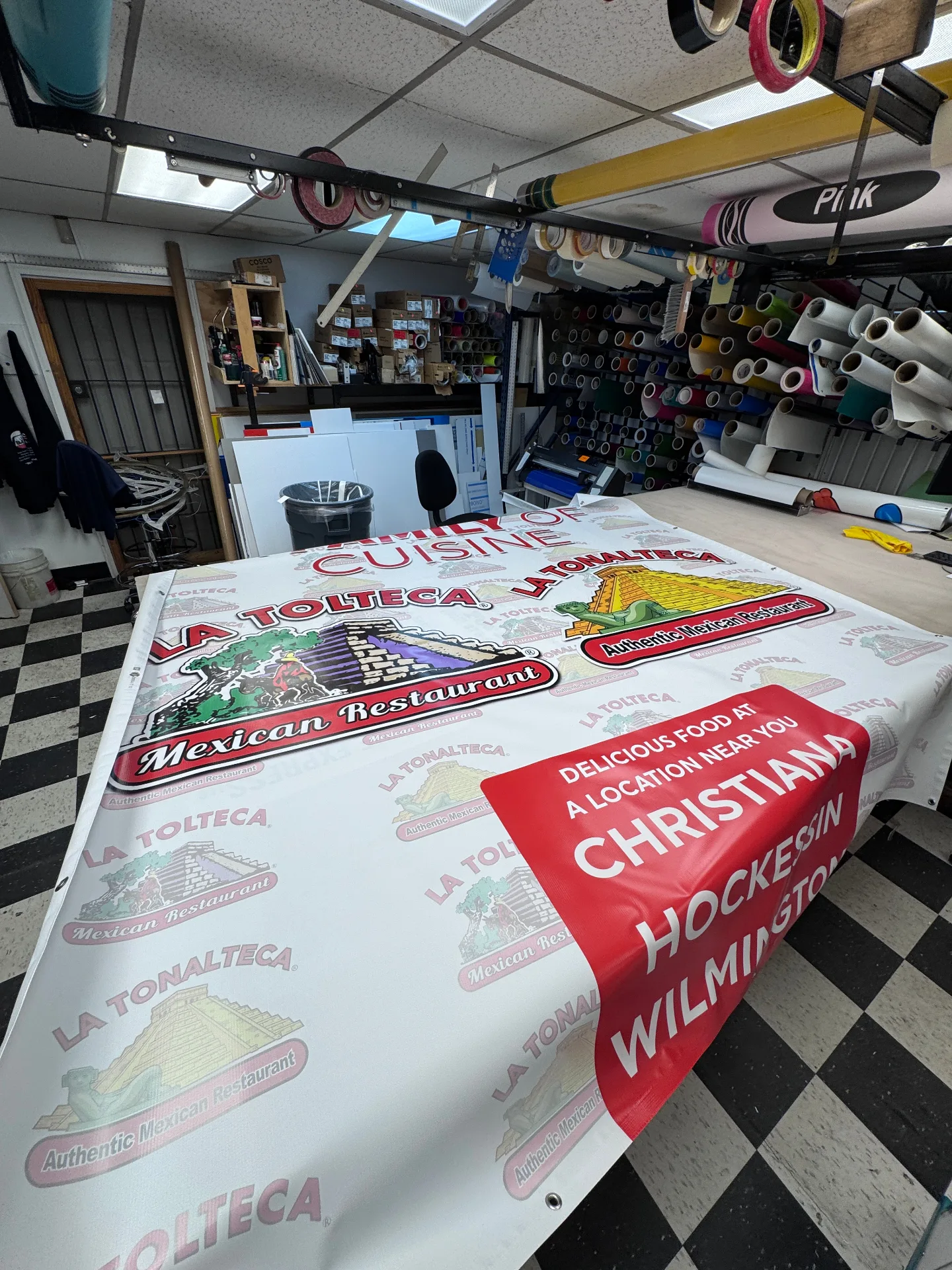 Banner production process for La Tonalteca restaurant in Delaware