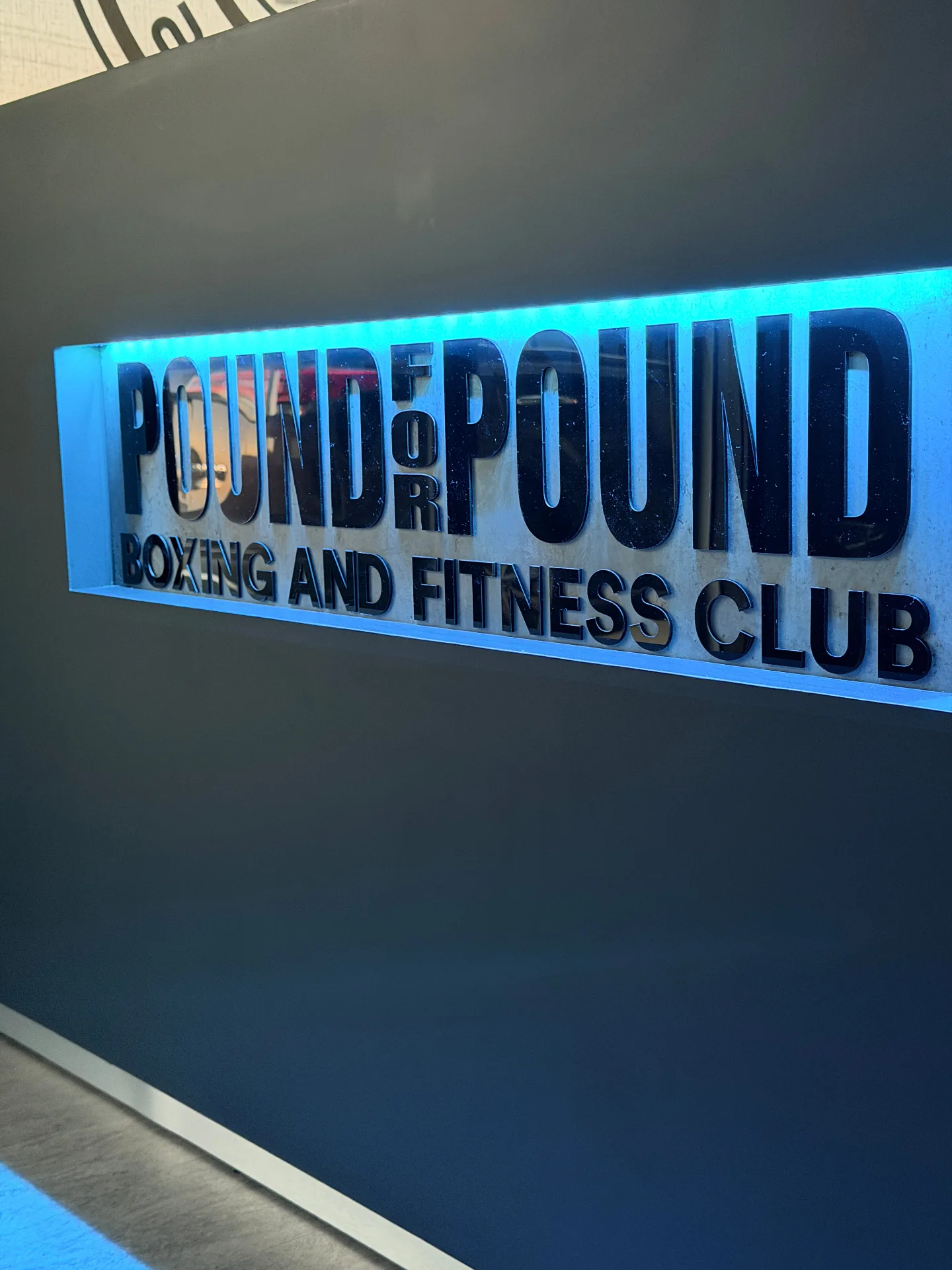 Illuminated business sign for Pound for Pound Gym in Delaware